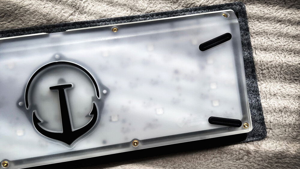 Polished polycarbonate bottom and black weight.